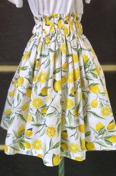 New designer skirt from our shop. It's made from beautiful lemon cotton fabric. With elastic on the waist so fits all sizes. Legth - 70 cm * * * * * * * View more hair accessories from FlosCaeli here: http://www.etsy.com/shop/FlosCaeli?section_id=12048806 FlosCaeli Shop Home: http://www.etsy.com/shop/FlosCaeli Cotton Relaxed Skirt For Garden Party, Relaxed Cotton Skirt For Garden Party, Cotton Full Skirt For Garden Party, Yellow Cotton Skirt For Spring, Yellow Full Skirt Dress With Lined Skirt, Cotton Gathered Skirt For Vacation, Summer Cotton Gathered Skirt, Summer Cotton Skirt With Lining, Yellow Summer Skirt