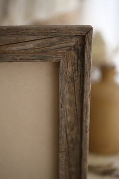 a wooden frame sitting on top of a table