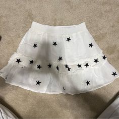 White Star Skirt New Without Tags Trendy White Tiered Skort, Trendy White Flared Skirt, Trendy White Mini Skirt, White Casual Mini Skirt For Party, Trendy White Flared Mini Skirt, Trendy White Summer Skirt, Trendy White Tiered Skirt, White Star Print Summer Bottoms, Summer White Star Print Bottoms