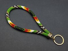 a lanyard with a metal ring on it