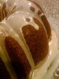 a bundt cake covered in icing sitting on top of a counter