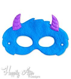 a blue mask with purple horns on it