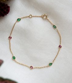 14K Natural Ruby Emerald Bracelet/ Round Ruby Oval Emerald Bracelet / July Birthstone Bracelet / Gold Bracelet / Everyday jewelry /Bracelets Specifics : Gemstone Name : Natural Ruby & Emerald Material : 14k Yellow Gold Bracelet Length: 7.0 Inch ( Adjustable ) Stone Shape : Round, Oval Gemstone Size : 3 and 4 MM Approx Gemstone weight: 1.85 ct Approx Gross weight: 1.32 grams Features : Handmade, Handcrafted, Hand-Polished Style : Bracelets Color : Green Red Great quality for making Necklace , Ear Ruby Chain, Black Beads Mangalsutra, Black Beads Mangalsutra Design, Polished Style, Birthstone Bracelet, Ruby Emerald, Yellow Gold Bracelet