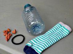 a water bottle and some socks on a table