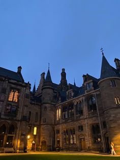 a large building with lots of windows at night