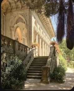 an old building with stairs leading up to it