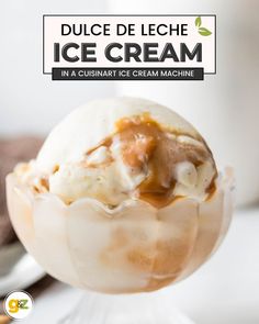 an ice cream sundae with caramel drizzled on top and the words dulce de leche in french above it