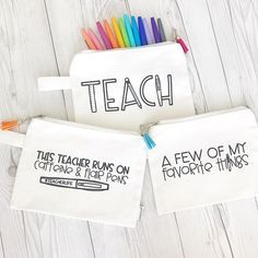 two white bags with colored pencils in them and the words teach written on them