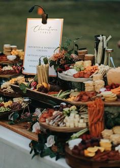 a table topped with lots of different types of food