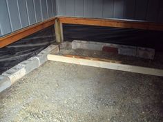 the inside of a house under construction with concrete and wood in place to support it