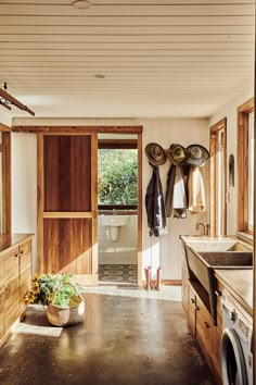 the kitchen is clean and ready to be used as a laundry room or mudroom