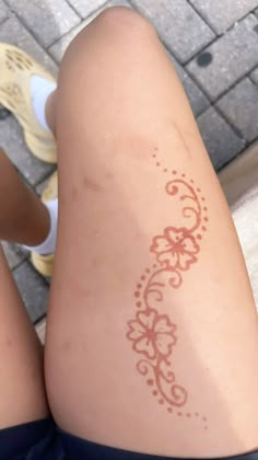 a person with a tattoo on their leg