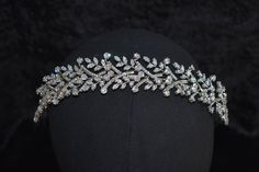 Beautiful and Elegant Luxury Wedding Bridal Headband Elevate your bridal look with our Bridal Headpiece! Handcrafted with crystals, and delicate floral accents, this piece adds a touch of enchantment to your special day. Made with simulated diamonds (AAA Zirconia Crystals)  Adjusts to any head size and is secured with pins Guaranteed to sparkle on your special wedding day! Check out our page https://dmluxurybridal.etsy.com for more designs in stock! Headband For Wedding, Crystal Bridal Headpiece, Bridal Hair Accessory, Bridal Hairstyle, Bridal Headpiece, Bridal Look, Luxury Bridal, Bridal Headband, Bridal Headpieces