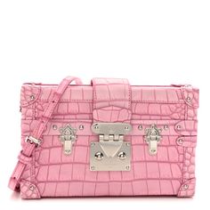 This is an authentic LOUIS VUITTON Alligator Petite Malle. This stylish bag is crafted beautifully in pink alligator skin. The bag features a front facing polished silver press lock for the half flap. Chloe 2024, Pink Alligator, Face Polish, Alligator Skin, Future Wardrobe, Polish Silver, The Bag, Stylish Bag, Authentic Louis Vuitton