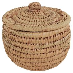 a large woven basket is shown on a white background, with the lid open to show it's handle