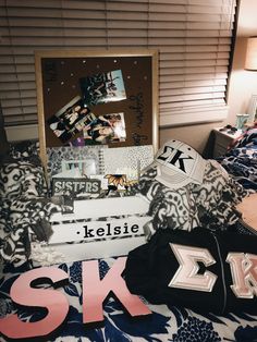 a bed with some pictures and letters on it