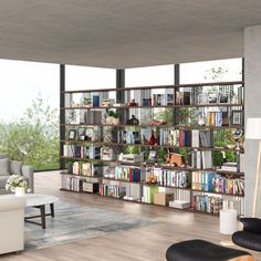 a living room filled with lots of furniture and bookshelves next to a window