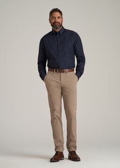 About Our Extra-Long Men's Shirt Reliable and versatile, you can wear this traveler shirt for tall men on any trip, to any meeting, with any outfit. Made of a polyester and spandex blend, it's as comfortable as your favorite tee with the class of a formal dress shirt. It has just the right amount of stretch so you can take it anywhere, whether you're catching flights or taking a big meeting in the boardroom. You want to feel confident in the fit and style of your clothes, which can be hard if yo Dark Blue Shirt Outfit Men, Mens Wedding Guest Outfit Fall, Mens Dress Shirts Outfit, Semi Formal Men Outfit, Navy Blue Shirt Outfit, Mens Clothing Styles Formal, Blue Shirt Outfit Men, Men Wedding Guest Outfit, Formal Dress Shirt