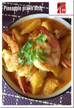 a bowl filled with shrimp and pineapple prawfish