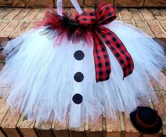 This snowman dress is absolutely adorable! Made from premium tulle fabric it is perfect for all Christmas events Sparkling tulle is placed throughout the dress for a nice classy look  Top hat is not included. You must select the option to add the top hat ! White Tulle Christmas Dress, Cute Christmas Tutu Dress For Festive Occasions, Holiday Costume Party Tutu Dress, White Christmas Party Tutu Dress, White Christmas Tutu Dress For Party, White Tulle Tutu Dress For Christmas, Snowman Fancy Dress, Christmas Tutu Dress For Dress-up, Christmas Tulle Tutu Dress For Dress-up