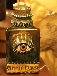 a glass bottle with an evil eye on it