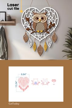 an owl is sitting on top of a heart - shaped wall clock with leaves hanging from it