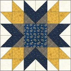 a blue and yellow quilted star pattern