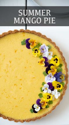 there is a pie with flowers on the top and bottom crust, ready to be eaten