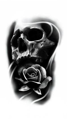 a black and white photo of a skull with a rose