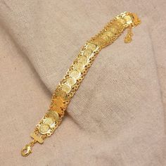 Luxury Gold Bangle For Ceremonial Occasions, Luxury Chandbalis For Celebration And Eid, Luxury Gold Chandbalis For Eid, Gold Metal Heart Bracelet For Wedding, Bohemian Gold Heart Bracelet As Gift, Bohemian Gold Heart Bracelet For Gift, Adjustable Gold Heart Bracelet Bohemian Style, Adjustable Gold Bohemian Heart Bracelet, Gold Bangle Charm Bracelet For Wedding