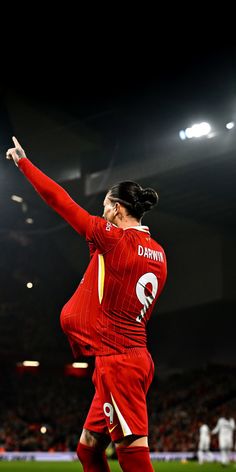 a female soccer player in action on the field