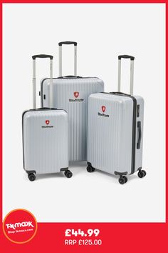 four pieces of luggage sitting next to each other on top of a red and white background