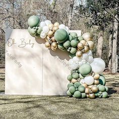 a large sign with balloons attached to it