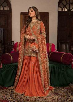 Burnt Orange Pakistani Bridal, Burnt Orange Pakistani Outfit, Garara Designs Latest, Orange Gharara, Unique Dress Designs, Bridal Gharara, Rust Orange Dress, Wedding Sharara, Unique Dress Design