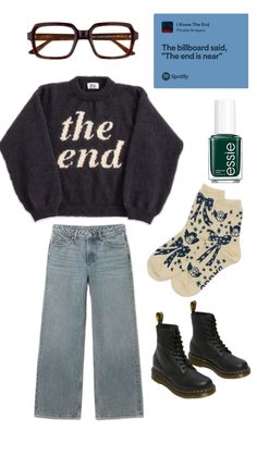 a sweater, jeans and shoes are arranged on a white background with the words the end written