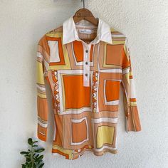 Nwt Retro Orange Geometric Blouse By Bugatchi Woman Gorgeous Totally Retro Piece! Remind See Of The Mid Century Era Style. Very Light Weight. Length Of Sleeve Hit Mid Length And Buttons Half Way. Would Pair Really Cute With Low Rise Boots Jeans! 100% Silk Condition: Brand New With Tags Labeled Size M, Check Measurements To Get A Better Idea Of Fit Measurements Laying Flat Pit To Pit: 19 In. Overall Length: 26.5 In.( Including Collar) Sleeve Length Taken From Top Hem: 19.5 In. Check Out My Instag Chic Orange Printed Top, Chic Retro Print Tops For Summer, Chic Orange Collared Top, White Retro Print Tops For Spring, Spring White Top With Retro Print, Orange Graphic Print Collared Tops, Retro White Blouse With Graphic Print, Retro White Long Sleeve Top, White Retro Long Sleeve Top