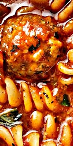 pasta with meatballs and sauce in a pan