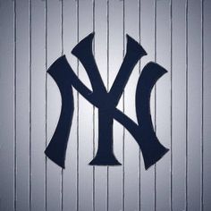 the new york yankees logo is displayed on a wall