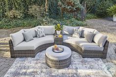 an outdoor patio furniture set on a rug