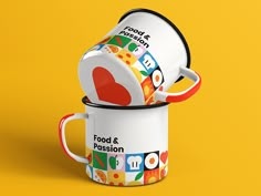 two coffee mugs stacked on top of each other with the words food & passion printed on them