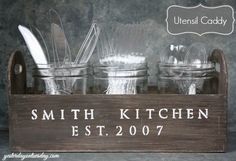 there is a wooden sign that says smith kitchen