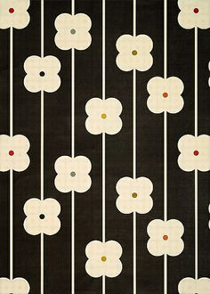 a black and white wall with flowers on it