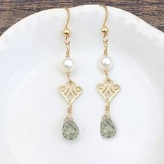 A touch of filigree and Pearl wit a teardrop gem make these an instant classic. Light and airy, movement and elegance make these a great everyday earring. Length 1.5″ Filigree Earrings, Green Amethyst, Everyday Earrings, Beautiful Jewelry, Gold Filled, Handmade Jewelry, Amethyst, Gems, Style Inspiration