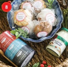 a basket filled with cookies and other food items