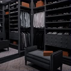 the closet is full of clothes and shoes for all kinds of men's wardrobes