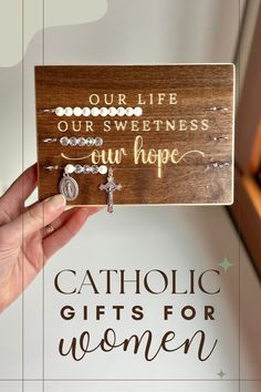 a wooden sign that says our life our sweetness our hope catholic gifts for women