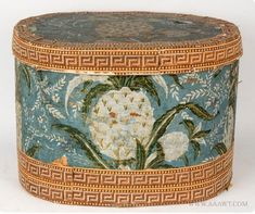 an ornately decorated box with flowers on it