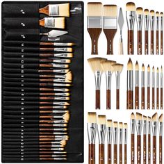 an assortment of paint brushes with different sizes and colors