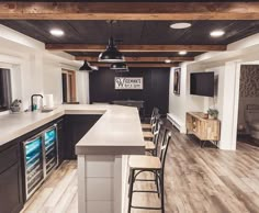 the kitchen is clean and ready to be used for cooking or dining room furniture, including bar stools