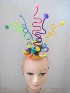 * This is a simple festive headpiece that would be perfect for that fun seeking gal who loves to party or for a birthday celebration or a kid's playday.   *  This design features Five (5) different colors curled acrylic tubes each with it's own pom pom.  The base of the design is covered in the various colors of pom poms and acrylic oblong forms all for that party feel. *   It's well balanced and comfortable and made to sit directly on top of the head and will fit just about any head size.  It i Pom Pom Hats, Spongebob Musical, Junk Kouture, Festival Headpiece, Floral Headdress, Clown Horror, Unicorn Fashion, Headpiece Diy, Diy Pom Pom